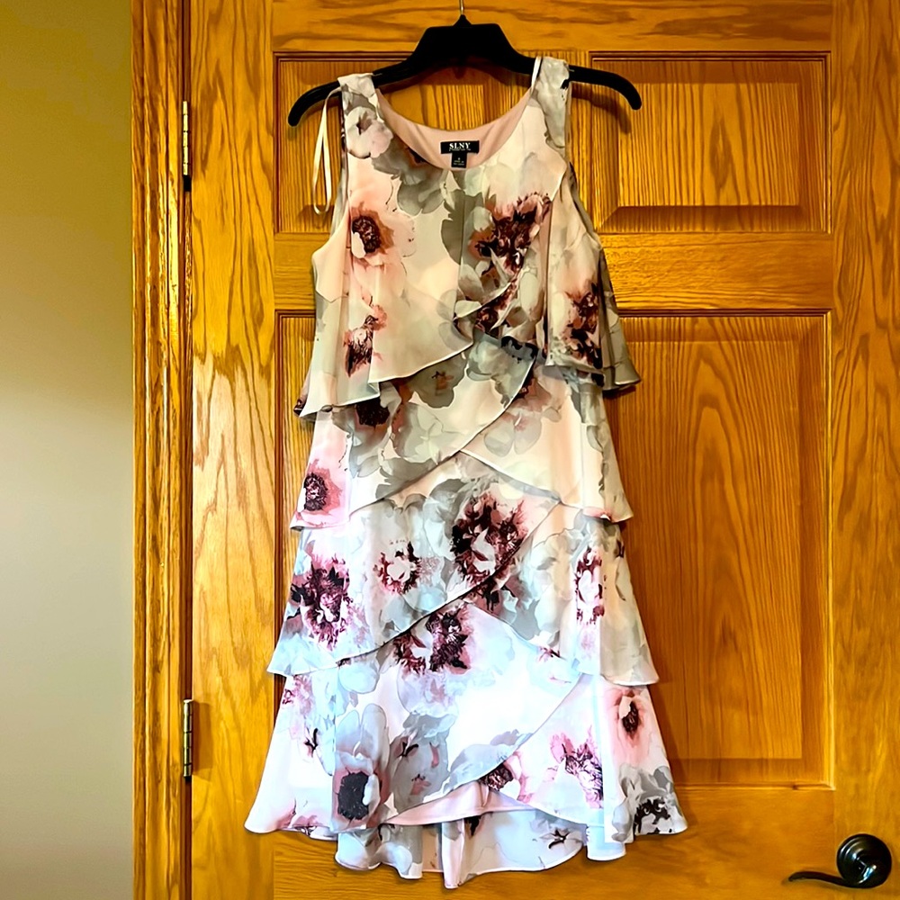 Pink floral dress.  Above the knee.  Worn one time to a wedding.